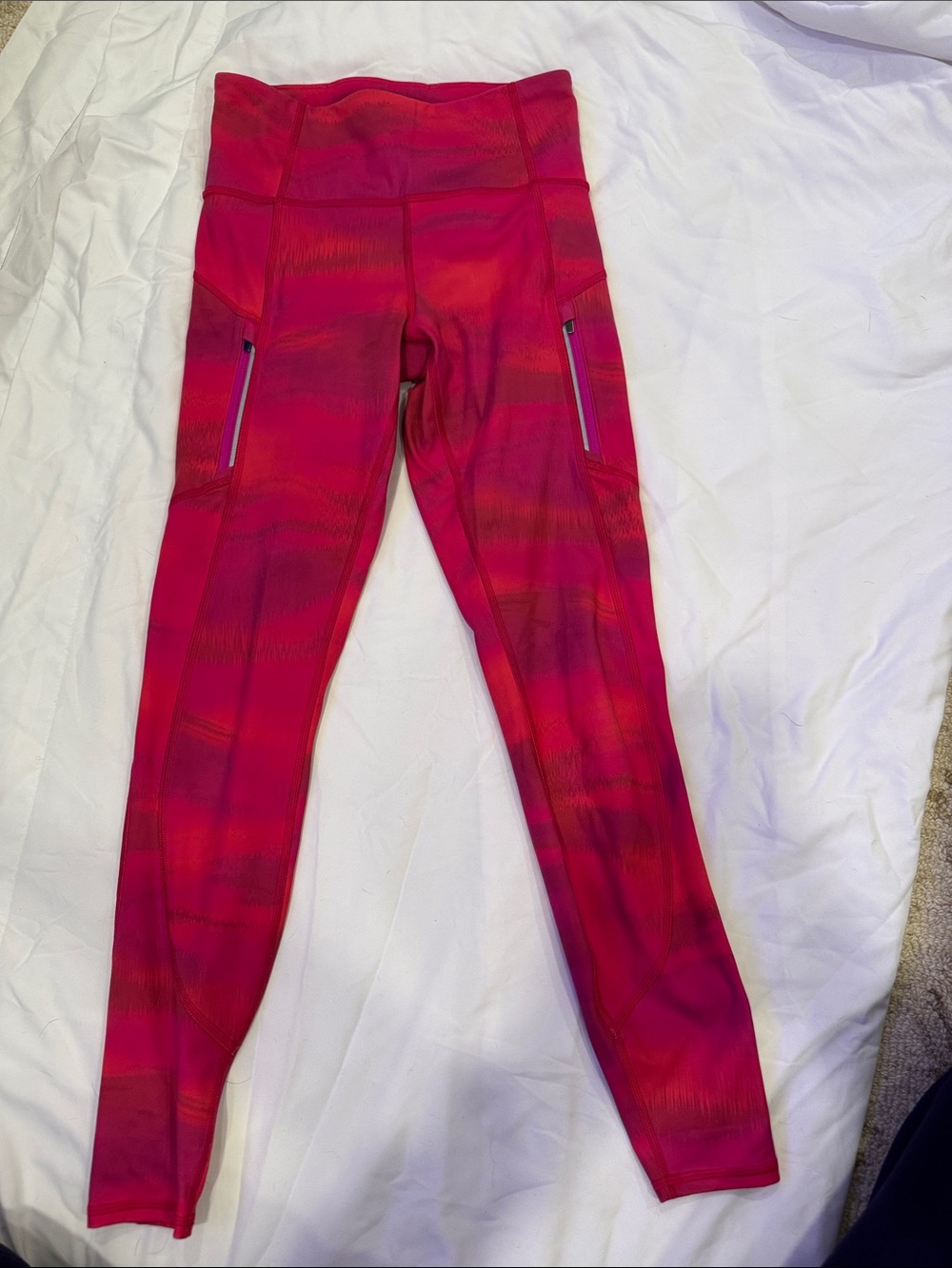 Women’s Athleta Hot Pink Active Leggings with zipper side Pockets